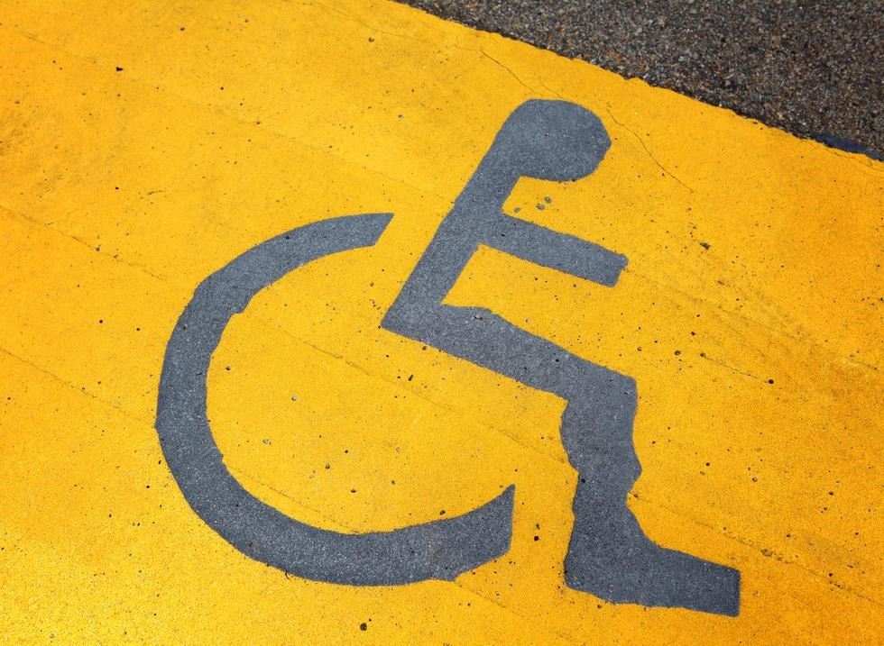 En symbol för rullstolsburen persom